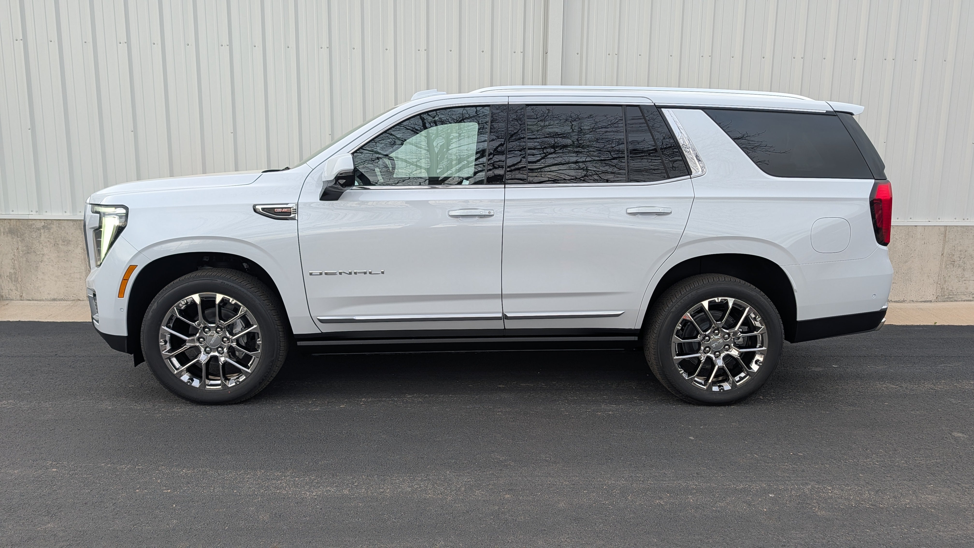 2026 GMC Yukon Denali in Glacier White Tricoat — front three-quarter view