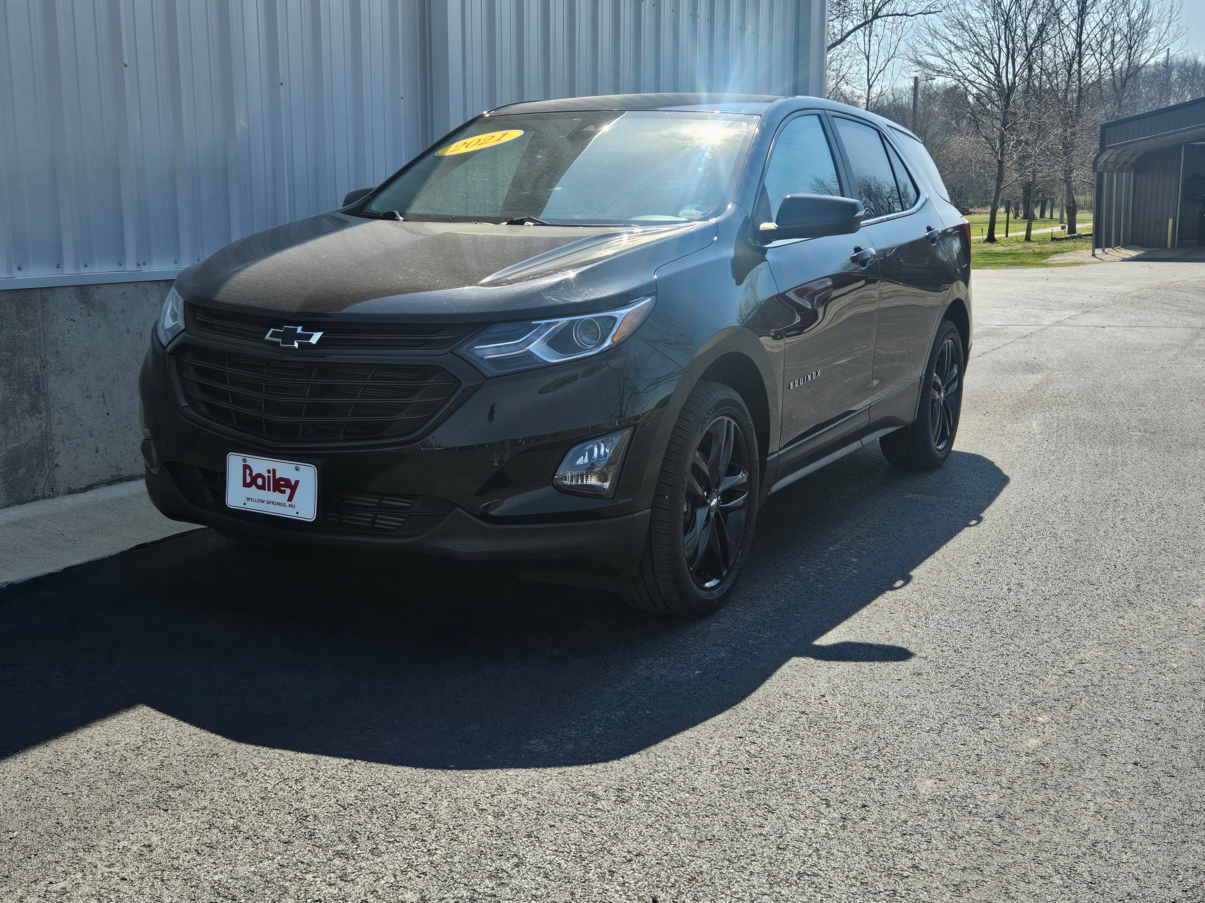 2021 Chevrolet Equinox LT in Mosaic Black Metallic — front three-quarter view